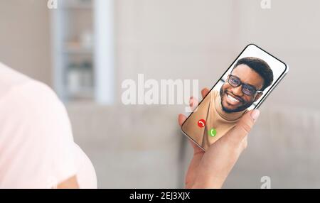 Unrecognizable woman using cellphone for remote communication, talking to her boyfriend online, panorama Stock Photo