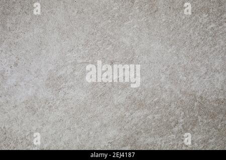 Stone tile texture detail with grain and cracks. Natural pattern for backgrounds. Flat lay, top view. Stock Photo