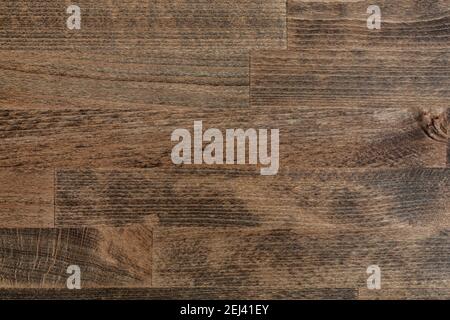 Dark brown wood texture. Parquet pattern. Painted and marinated pinewood board. Flat lay top view. Natural light and colour. Stock Photo