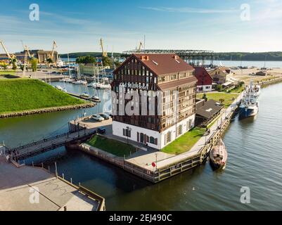 KLAIPEDA, LITHUANIA - AUGUST 9, 2020: Aerial view of beautiful yachts by the pier in the yacht club in Klaipeda, Lithuania. Klaipeda old castle site. Stock Photo