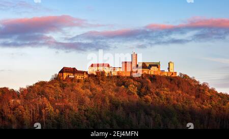 View of Wartburg Castle in autumn, evening light, Thuringian Forest, Eisenach, Thuringia, Germany Stock Photo