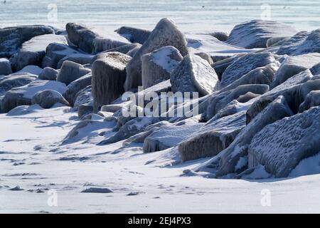 Icy landscapes in winter at harbour Stock Photo