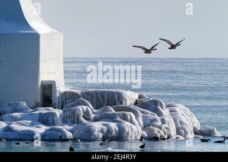 Icy landscapes in winter at harbour Stock Photo