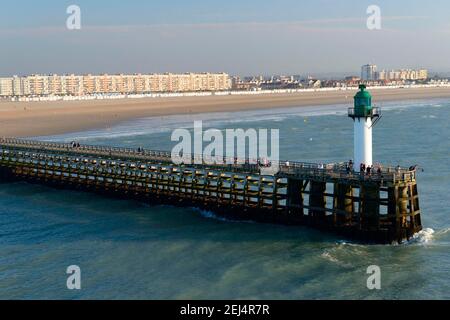 Port entrance and beach, Calais, France Stock Photo