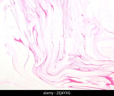 Pink, pastel, and white liquid marble texture. Handmade acrylic colors abstract background. Stock Photo