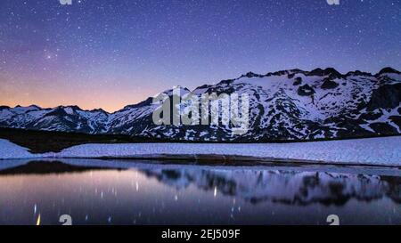 Maladeta range and the Aneto peak at night. Viewed from the other side of the valley, near to Port de Benasque (mountain pass, Benasque Valley, Spain) Stock Photo