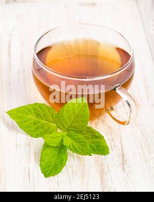Herbal tea on wooden board Stock Photo