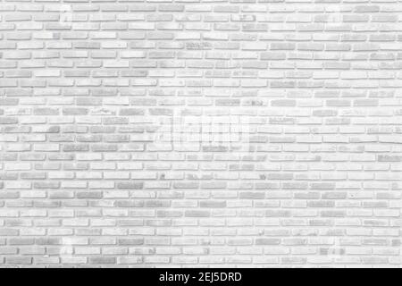White brick walls that are not plastered background and texture. The texture of the brick is white. Background of empty brick basement wall. Stock Photo