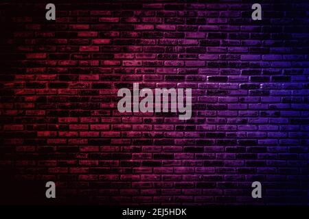 Neon light on brick walls that are not plastered background and texture. Lighting effect red and blue neon background vertical of empty brick basement Stock Photo