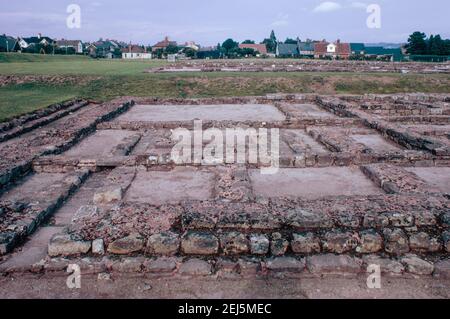 Caerleon near Newport, Wales - ruins of legionary fortress for 2nd Roman Legion Augusta. Centurion’s quarters with barracks in the back. Archival scan from a slide. October 1975. Stock Photo