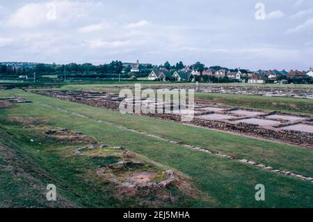 Caerleon near Newport, Wales - ruins of legionary fortress for 2nd Roman Legion Augusta. Camp ovens with barracks in the back. Archival scan from a slide. October 1975. Stock Photo