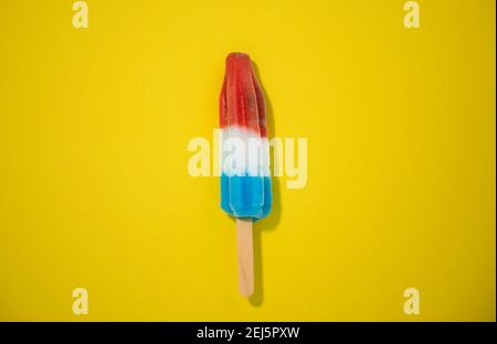 Novelty ice cream treat shot on solid colorful background. Series 1 of 9. Stock Photo