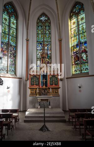 Interior view of Roman Catholic Church 'St. Nikolaus' with its stained glass windows of Hans Lünenborg Stock Photo