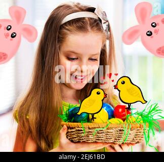 Easter happy girl child with bunny egg in nest. Stock Photo