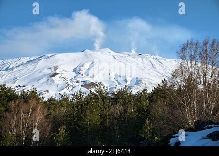 trhee plumes of smoke from central craters of Etna Volcano, Sicily Stock Photo