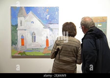 People inside an art gallery in the U.S.A. Stock Photo