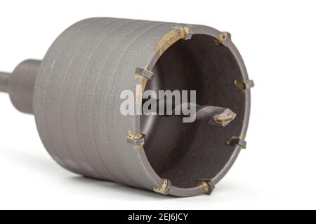 Percussion core hammer drill bit for cutting holes into base materials, isolated on white background Stock Photo