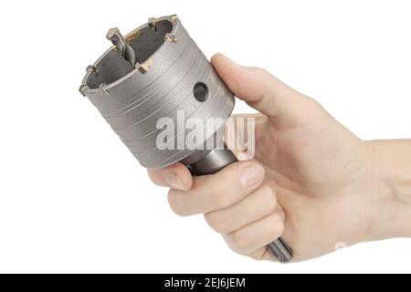 Female hand holding impact core drill, isolated on white background Stock Photo