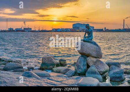 Copenhagen, Denmark - April 12, 2018: sunrise city skyline at Little Mermaid Statue Stock Photo