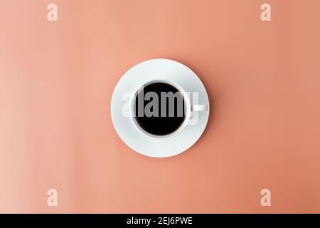 White plate, cup of coffee on beige background. High quality photo Stock Photo