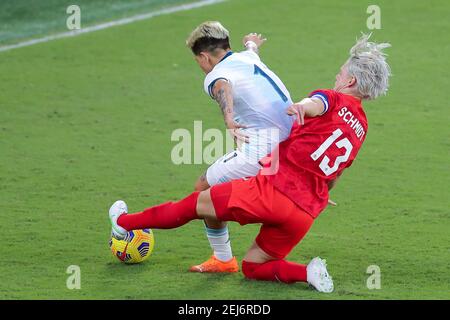 Orlando, Florida, USA . February 21, 2021: Canada midfielder SOPHIE SCHMIDT (13) makes a sliding tackle against Argentina forward YAMILA RODRIGUEZ (11) during the SheBelieves Cup Argentina vs Canada match at Exploria Stadium in Orlando, Fl on February 21, 2021. Credit: Cory Knowlton/ZUMA Wire/Alamy Live News Stock Photo