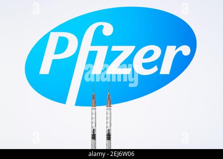 Izmir, Turkey - February 21 2021: Coronavirus vaccine concept and background. Pfizer and biontech vaccine syringes isolated on white background. Covid Stock Photo