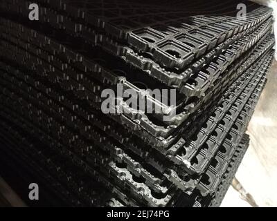 Rubber honeycomb dust mat. A mat with holes for snow and mud. Stock Photo
