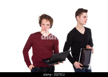 Study and work. Two young attractive students with laptops. Stock Photo