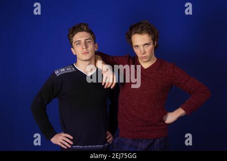 Study and work. Two young attractive students with laptops. Stock Photo