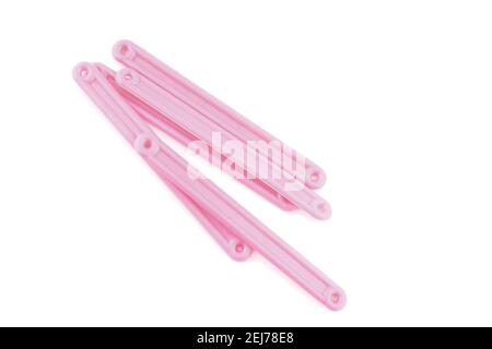 pink counting sticks on a white background Stock Photo