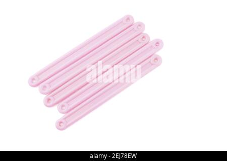 pink counting sticks on a white background Stock Photo