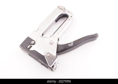 metal construction stapler on white background Stock Photo
