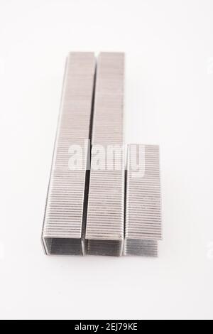staples for construction stapler on white background Stock Photo