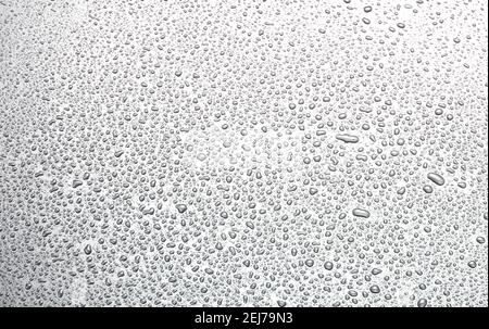 water drop background. rain drops on shiny metal surface Stock Photo