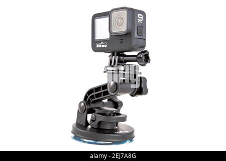 moscow, russia - Novemner 11, 2020: new flagship action camera gopro hero 9 black on original accessory mount tripod. isolated on white background.. Stock Photo