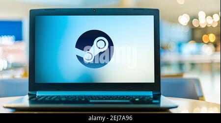 POZNAN, POL - AUG 8, 2020: Laptop computer displaying logo of Steam, a video game digital distribution service by Valve Stock Photo