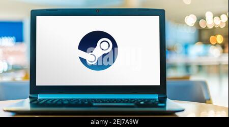 POZNAN, POL - AUG 8, 2020: Laptop computer displaying logo of Steam, a video game digital distribution service by Valve Stock Photo