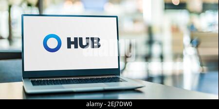 POZNAN, POL - SEP 23, 2020: Laptop computer displaying logo of HUB International, an insurance brokerage Stock Photo
