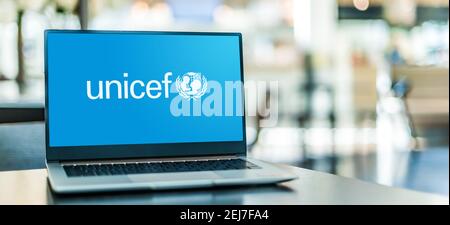 POZNAN, POL - NOV 12, 2020: Laptop computer displaying logo of UNICEF or United Nations Children's Fund, a UN agency responsible for providing humanit Stock Photo