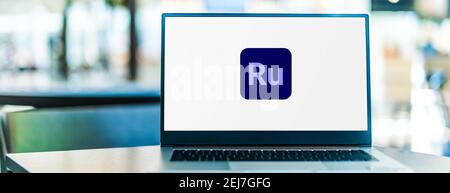 POZNAN, POL - NOV 12, 2020: Laptop computer displaying logo of Adobe Premiere Rush Stock Photo