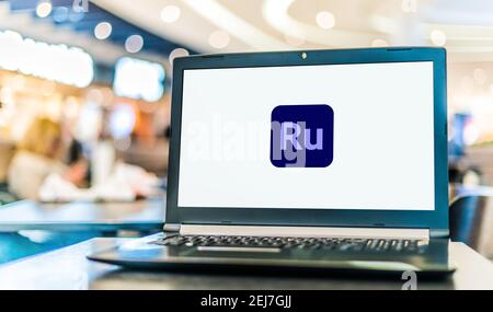 POZNAN, POL - NOV 12, 2020: Laptop computer displaying logo of Adobe Premiere Rush Stock Photo