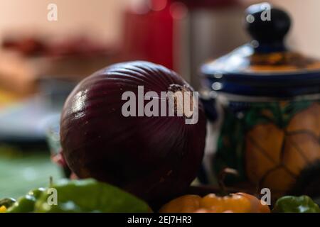 set of red and purple onions on cutting wood Stock Photo