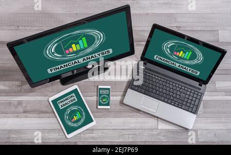 Financial analysis concept shown on different information technology devices Stock Photo