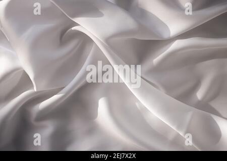 Smooth elegant white silk or satin texture Stock Photo