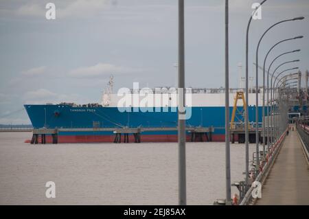 Tangguh LNG Jetty with LNG Tanker, Tangguh Foja; first cargo for new plant, Tangguh LNG, Liquified Natural Gas Plant, Babo, West Papua, Indonesia Stock Photo