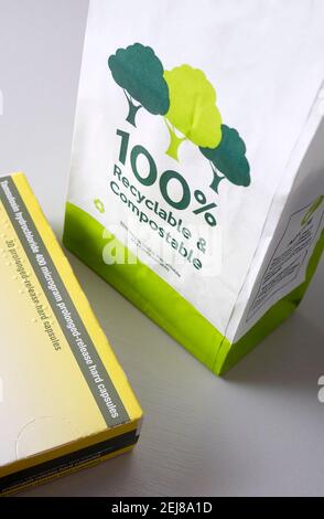 nhs prescription paper bag, 100% recyclable and compostable on grey background Stock Photo