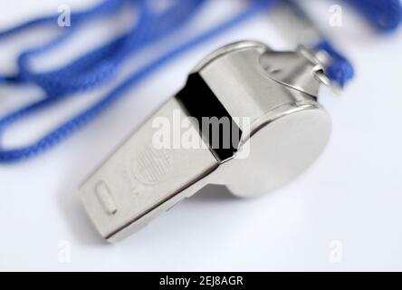 metal sports whistle on white background Stock Photo