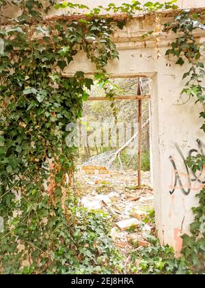 A ruined country house in Valencia, Spain, surrounded by exquisitely lush gardens. Stock Photo