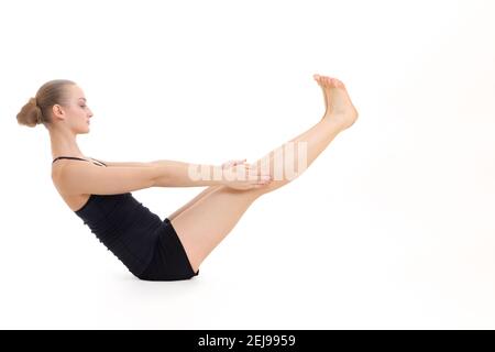 Sporty Woman Doing Yoga Exercises Sitting in Paripurna Navasana, Full Boat  Pose. Stock Photo - Image of person, pilates: 153484994