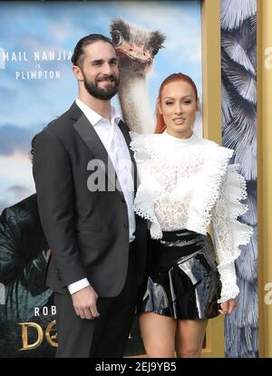 Seth Rollins and Becky Lynch attend the premiere of 'Dolittle' at